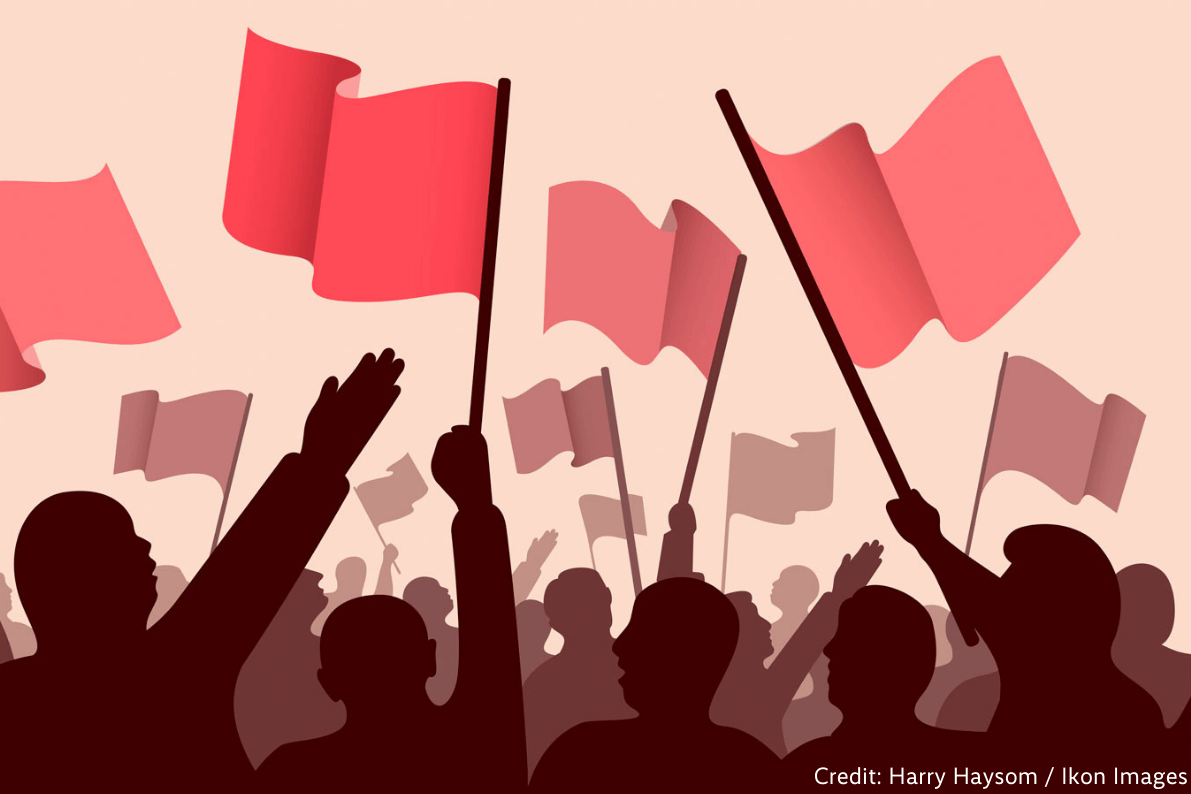An illustration by Harry Haysom by IKON Images shows the silhouettes of a crowd of people waving flags, with a prominent figure in the front raising their right arm.