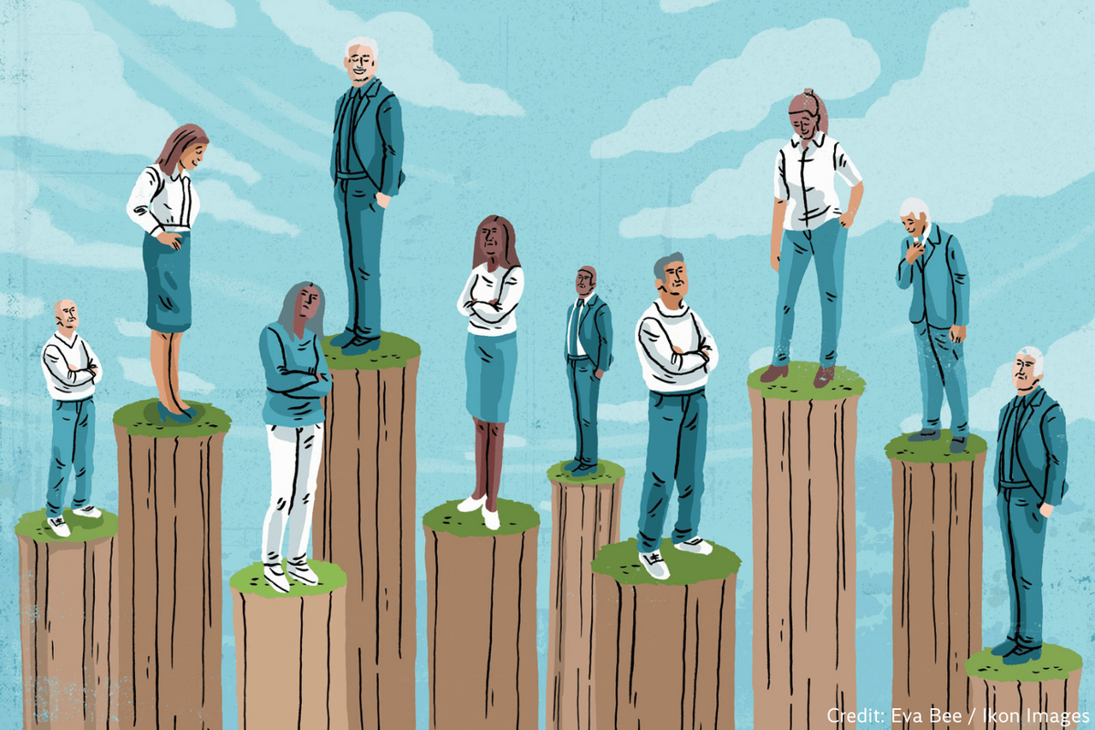An illustration by Eva Bee from IKON Images shows different people standing on tree stumps of different sizes, showcasing the concept of inequality.